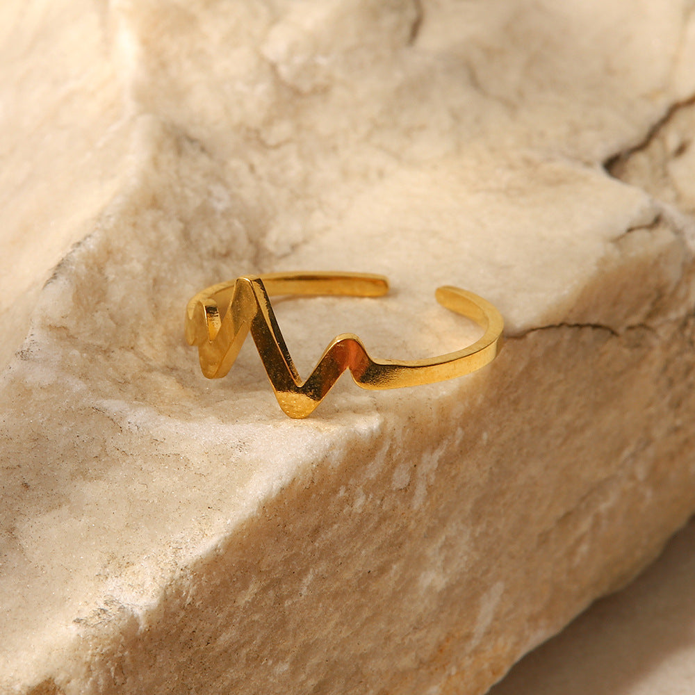 Anello da donna in acciaio al titanio placcato oro 18K, geometrico, minimalista, ispirato alla Francia, con design a battito cardiaco
