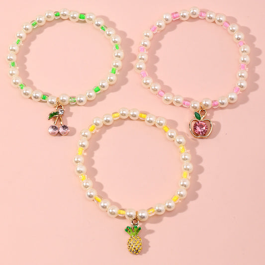 Set di braccialetti per bambine in stile cartone animato a forma di frutta, con perle e base in lega, per bambine dai 6 ai 10 anni