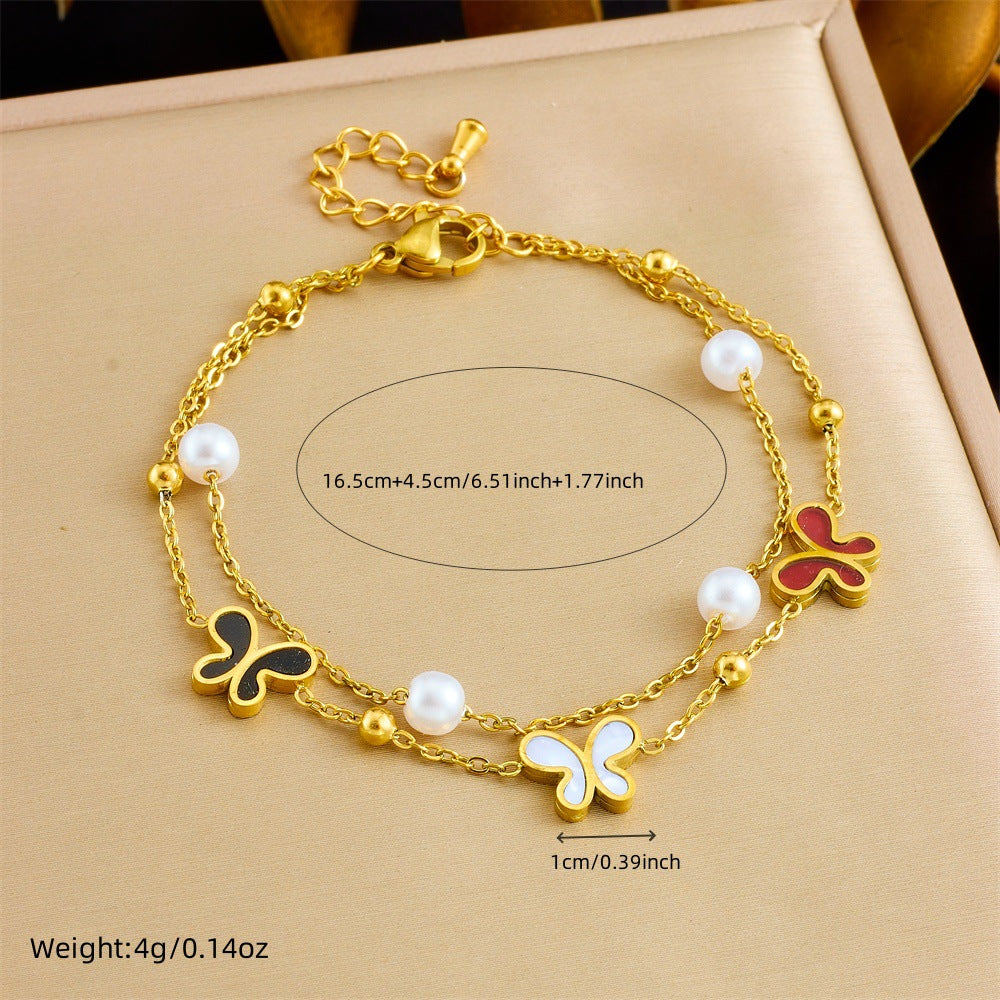 Bracciale minimalista da donna in acciaio inossidabile a forma di fiocco con placcatura in oro e inserti di perle