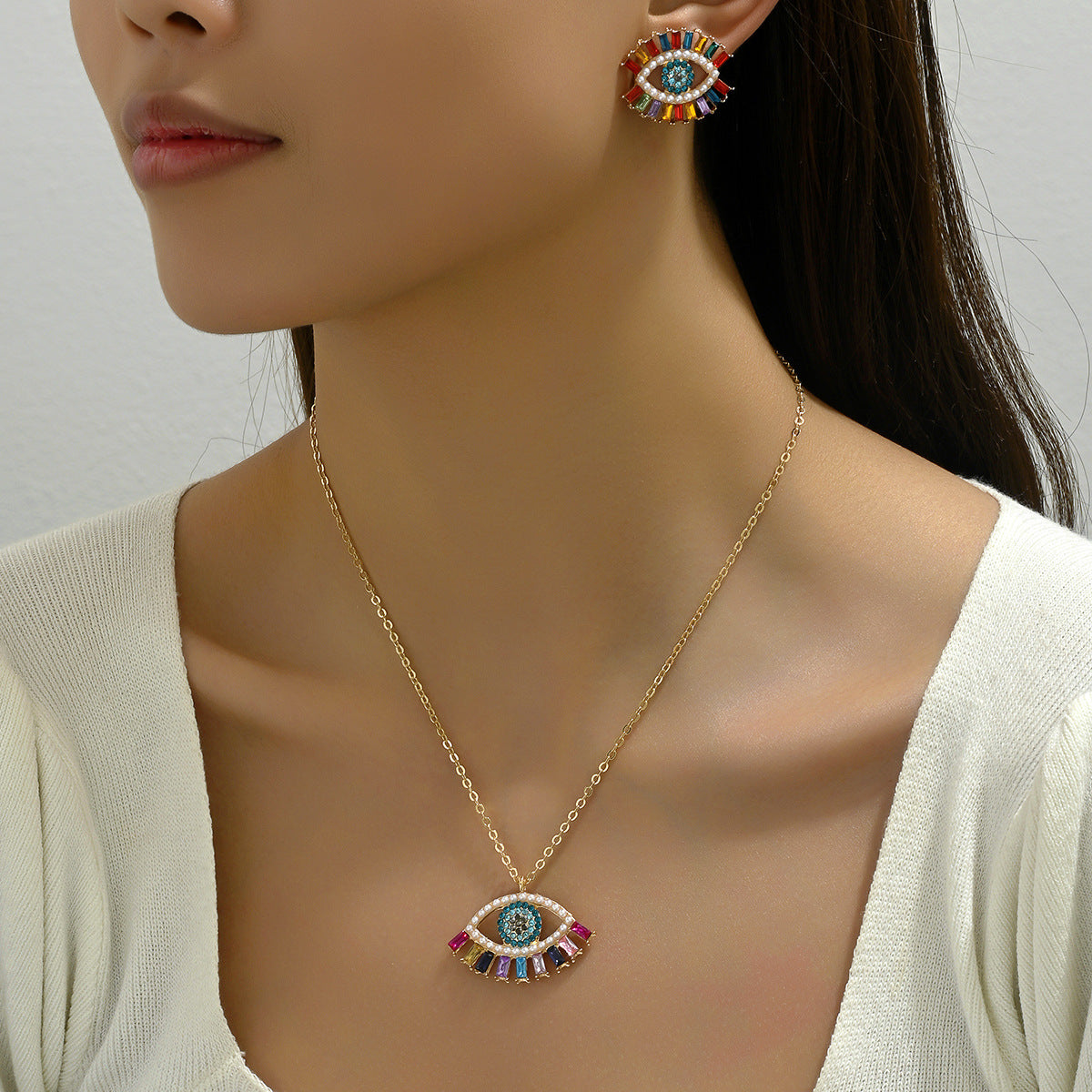 Juego de collar con colgante de ojo de ángel de estilo hip hop minimalista y pendientes de tuerca para mujer, aleación con incrustaciones de diamantes de imitación