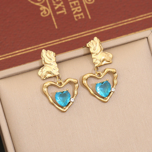 Aretes de acero inoxidable con forma de corazón irregular y acabado chapado para mujer