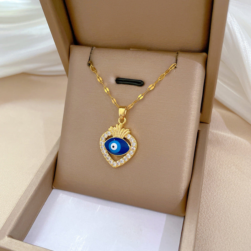 Collana con ciondolo in acciaio al titanio di lusso con motivo geometrico a occhio di Allah e strass, a forma di luna, unisex
