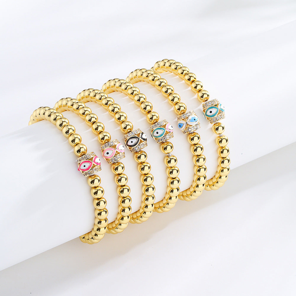 Bracciale sottile da donna geometrico minimalista con amuleto dell'occhio di Allah, base in rame placcato oro 18 carati e zirconia incastonata con smalto