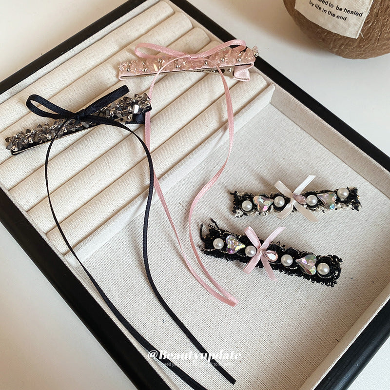 Pinza de pelo de aleación de estilo de lujo con forma de lazo y adornos de pedrería para mujer con detalles de perlas y diseño chic minimalista