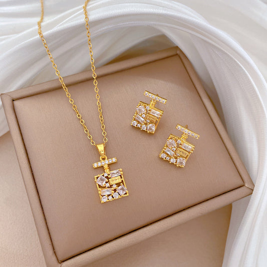 Set di collana e orecchini in acciaio al titanio con design geometrico minimalista, intarsio di strass e finitura placcata per donna
