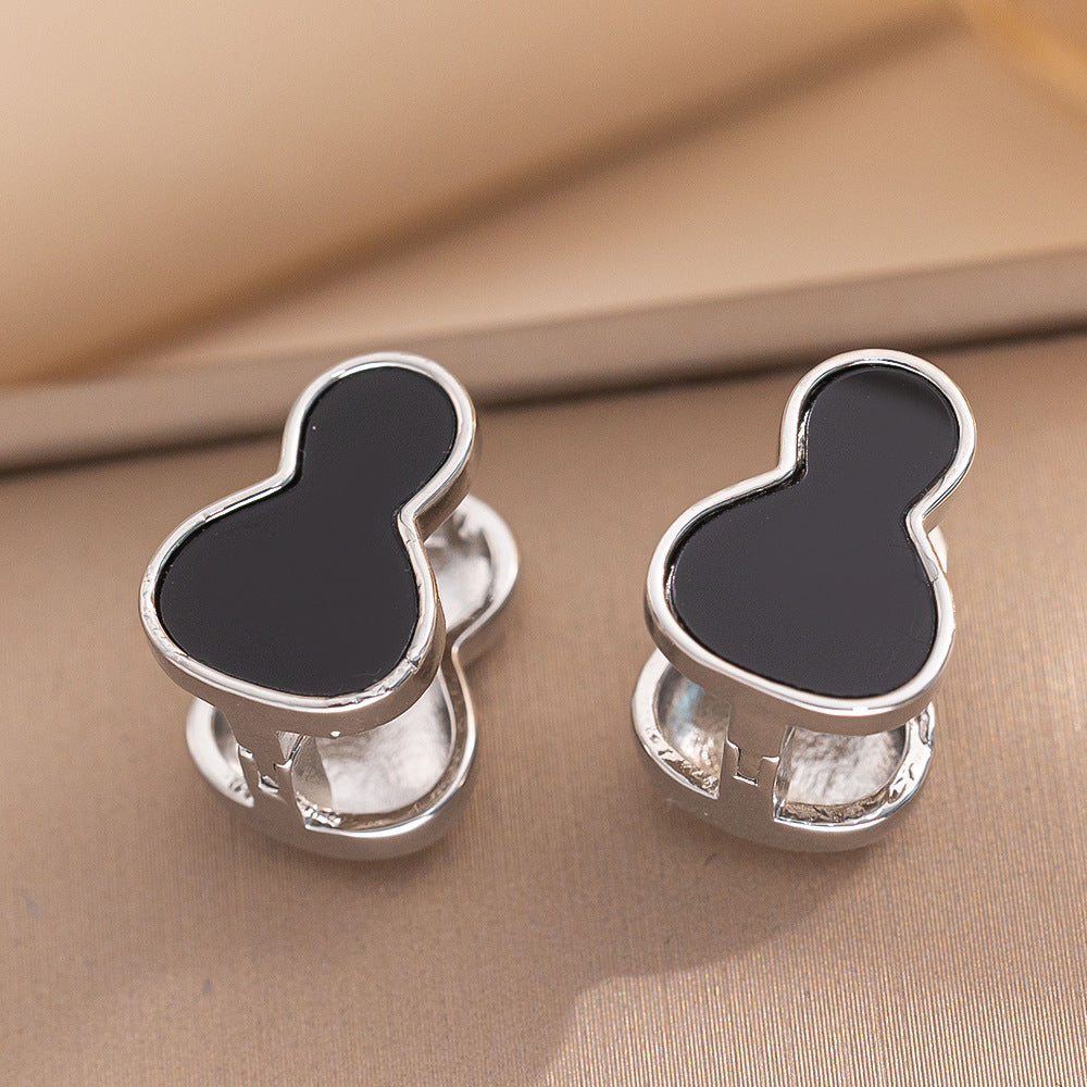 Orecchini a perno Saturno minimalisti color oro in ottone con zirconi per donna