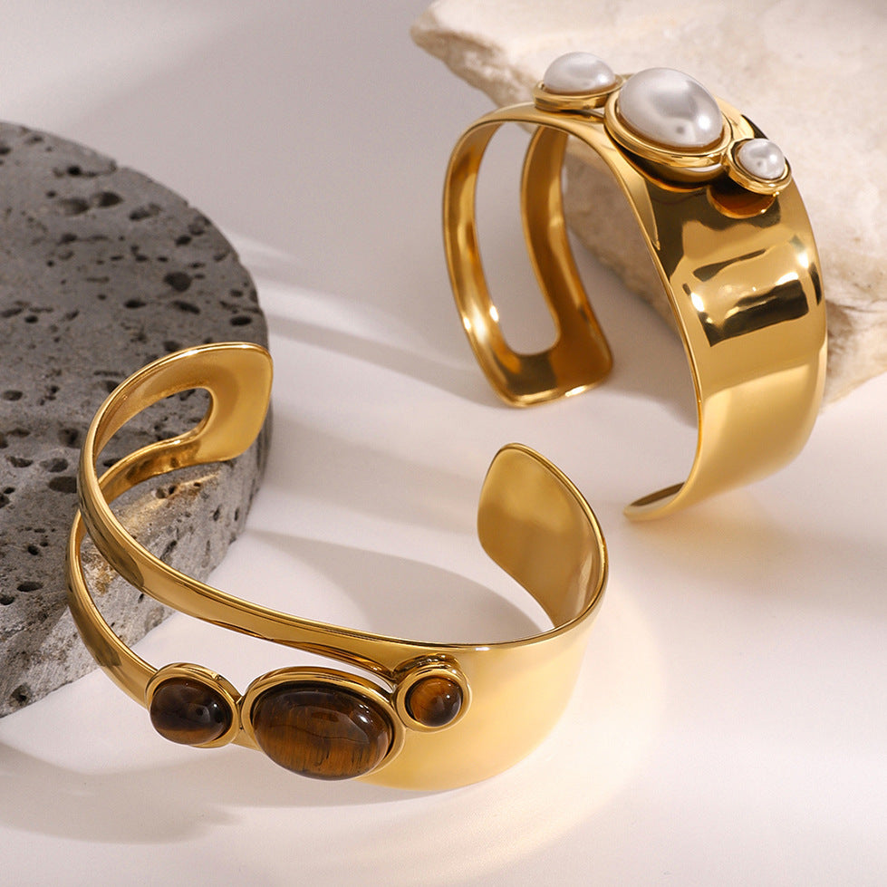 Bracciale alla moda traforato con perle in acciaio inossidabile con finitura placcata da donna