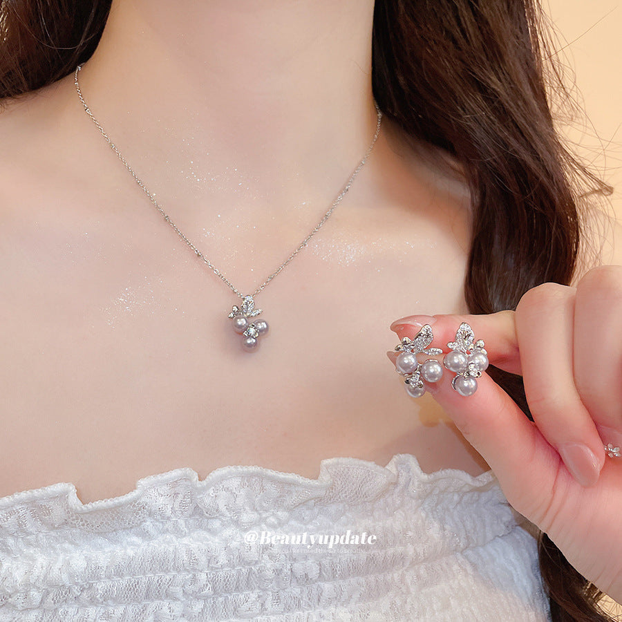 Elegante conjunto de collar y pendientes de perlas con diseño floral estilo francés, con detalles de pedrería, acabado chapado, cadena de clavícula, para mujer