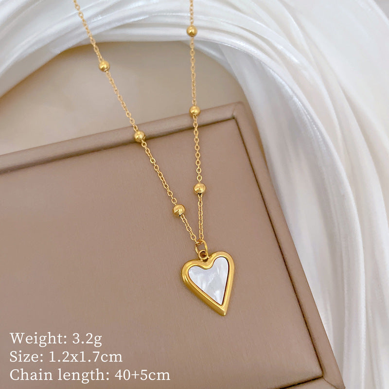 Collana con ciondolo a cuore minimalista in acciaio al titanio placcato oro per donna e uomo, stile medaglione a catena irregolare