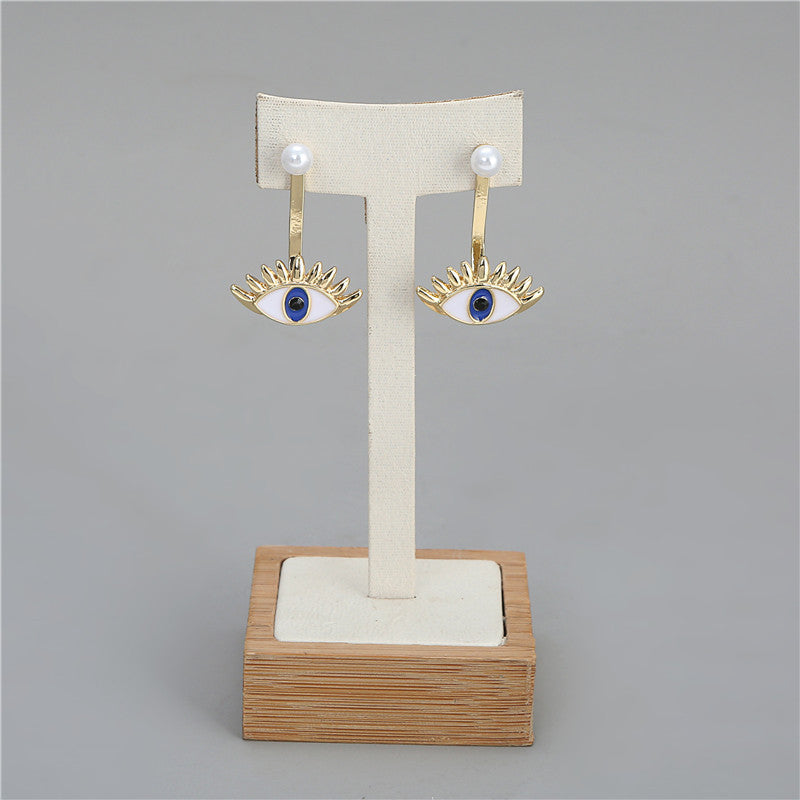 Exaggerated Evil Eye Pendant Alloy Earrings with Blue Enamel Eyes and Pearl Accents for Women