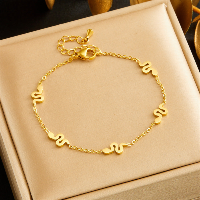 Set di Collana, Orecchini e Bracciale con Ciondolo a Serpente Minimalista in Acciaio Inossidabile Placcato