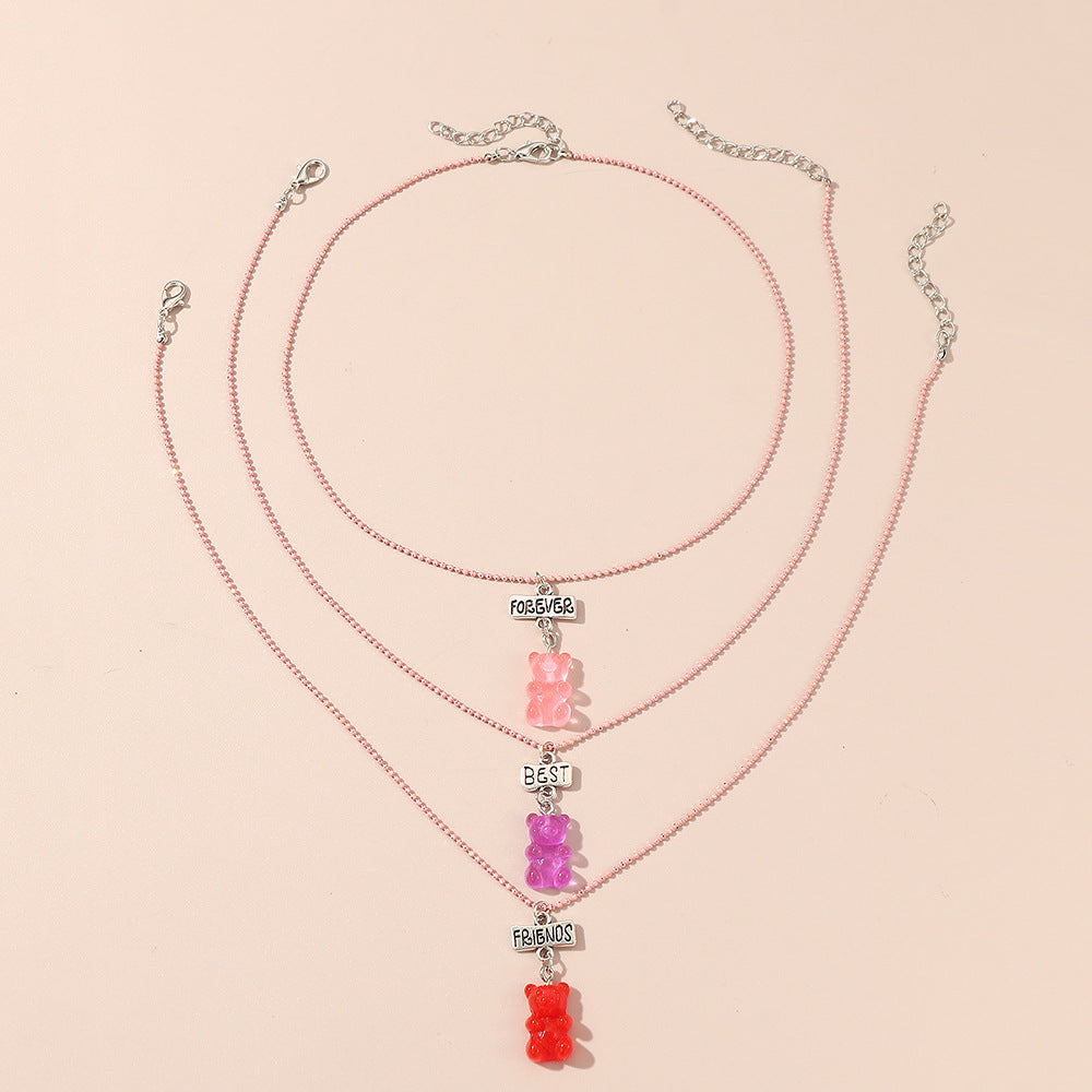 Set di collana in resina a forma di orsetto in stile fumetto per bambini con catena di perline rosa e lunghezza regolabile