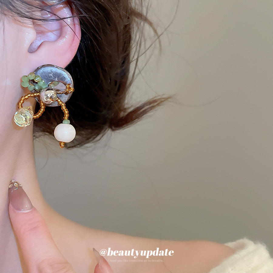 Orecchini a perno tondi stile etnico con perline di legno e perni in acciaio placcato argento per donna