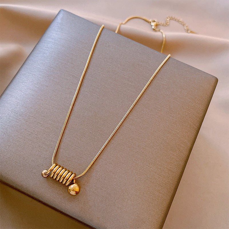 Minimalist Golden Titanium Steel Spiral Snake Chain Necklace for Women with Geometric Design and Clean Aesthetic