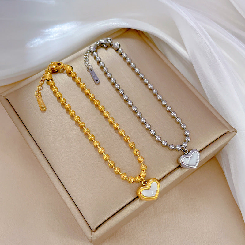 Pulsera de mano bohemia vintage de acero de titanio con corazón, cuentas redondas y ondas para mujer