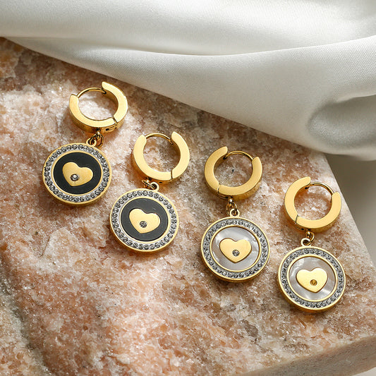 Orecchini in acciaio al titanio a forma di cuore geometrico con zirconi per donna con moda minimalista ed estetica di lusso