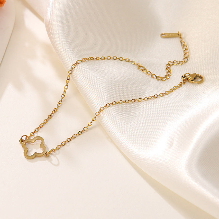 Elegante Bracciale Minimalista da Donna in Acciaio Inossidabile Placcato Oro con Zirconi e Quadrifoglio