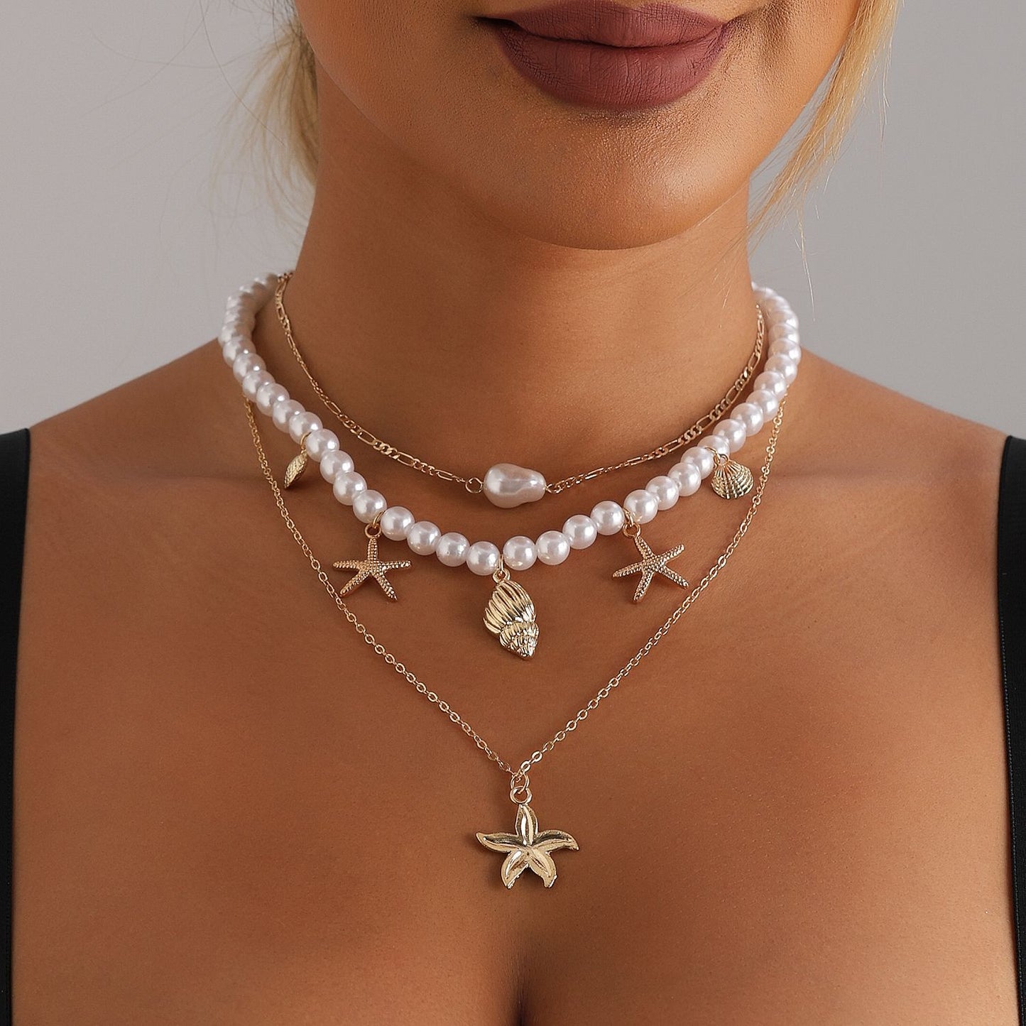 Collana bohémien da spiaggia con perline, ciondolo a stella e geometrico, perle imitation e lega, finitura galvanizzata, design asimmetrico irregolare, catena da donna per la clavicola
