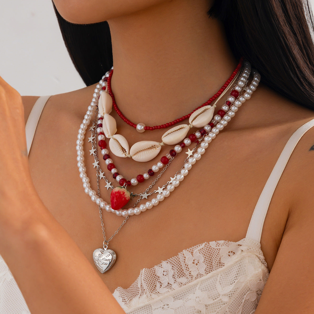 Set di collana da donna con conchiglie e perle a tema boho da spiaggia con ciondolo a cuore