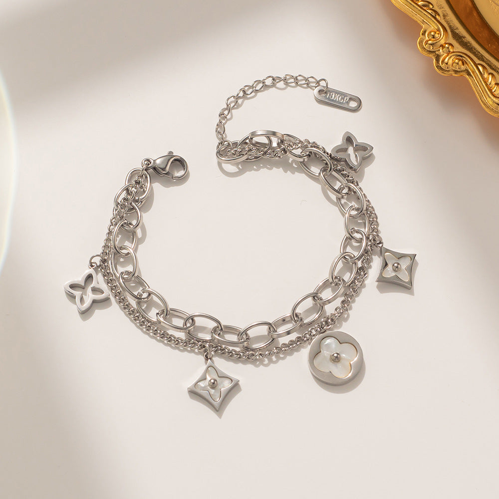 Bracciale minimalista in acciaio al titanio a forma di trifoglio con finitura placcata da donna