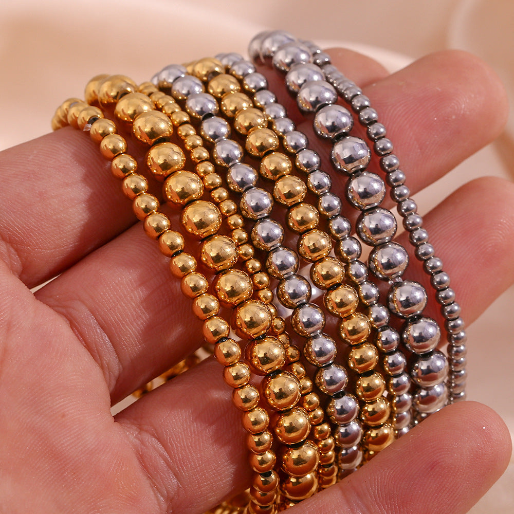 Pulsera elástica de cuentas de acero inoxidable chapada en oro de 18 quilates con diseño geométrico minimalista para mujer