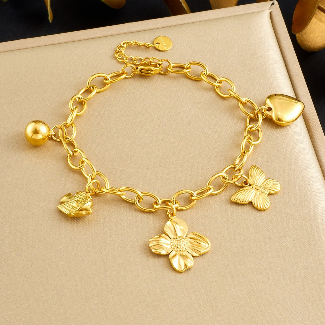 Gold Plated Stainless Steel Cable Chain Bracelet with Butterfly and Floral Charms