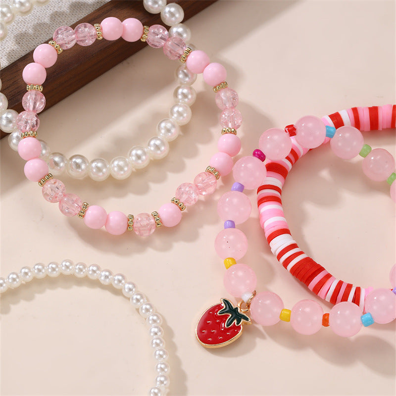 Bracciale per bambine con ciondolo a fiocco, perline acriliche e design a forma di stella