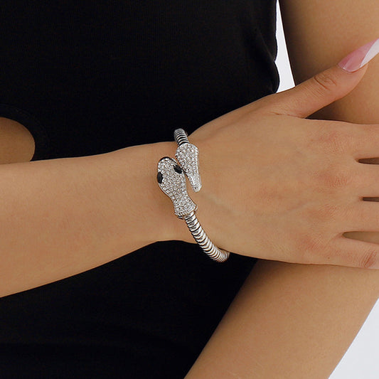 Braccialetto geometrico punk grintoso a forma di serpente con intarsi di strass e ferro galvanizzato