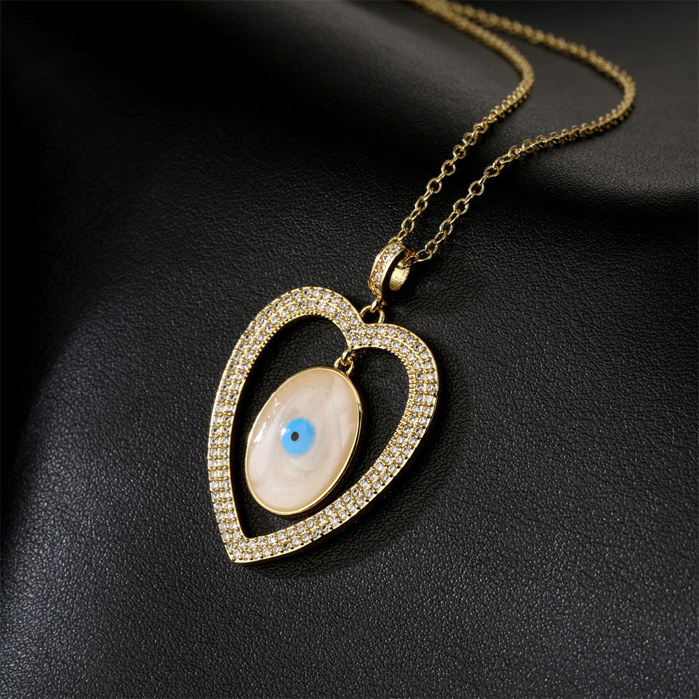 Collana da donna a sospensione geometrica minimalista in rame con placcatura in oro 18K e intarsio completo di zirconi a forma di occhio di Nazar