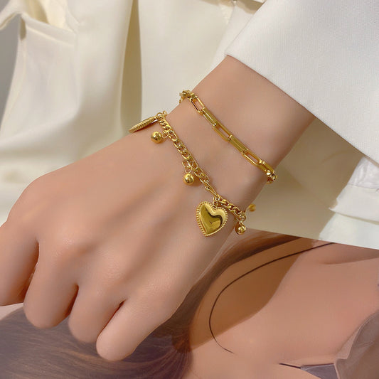 Pulsera de acero inoxidable de doble capa en forma de corazón minimalista dulce con acabado chapado para mujer
