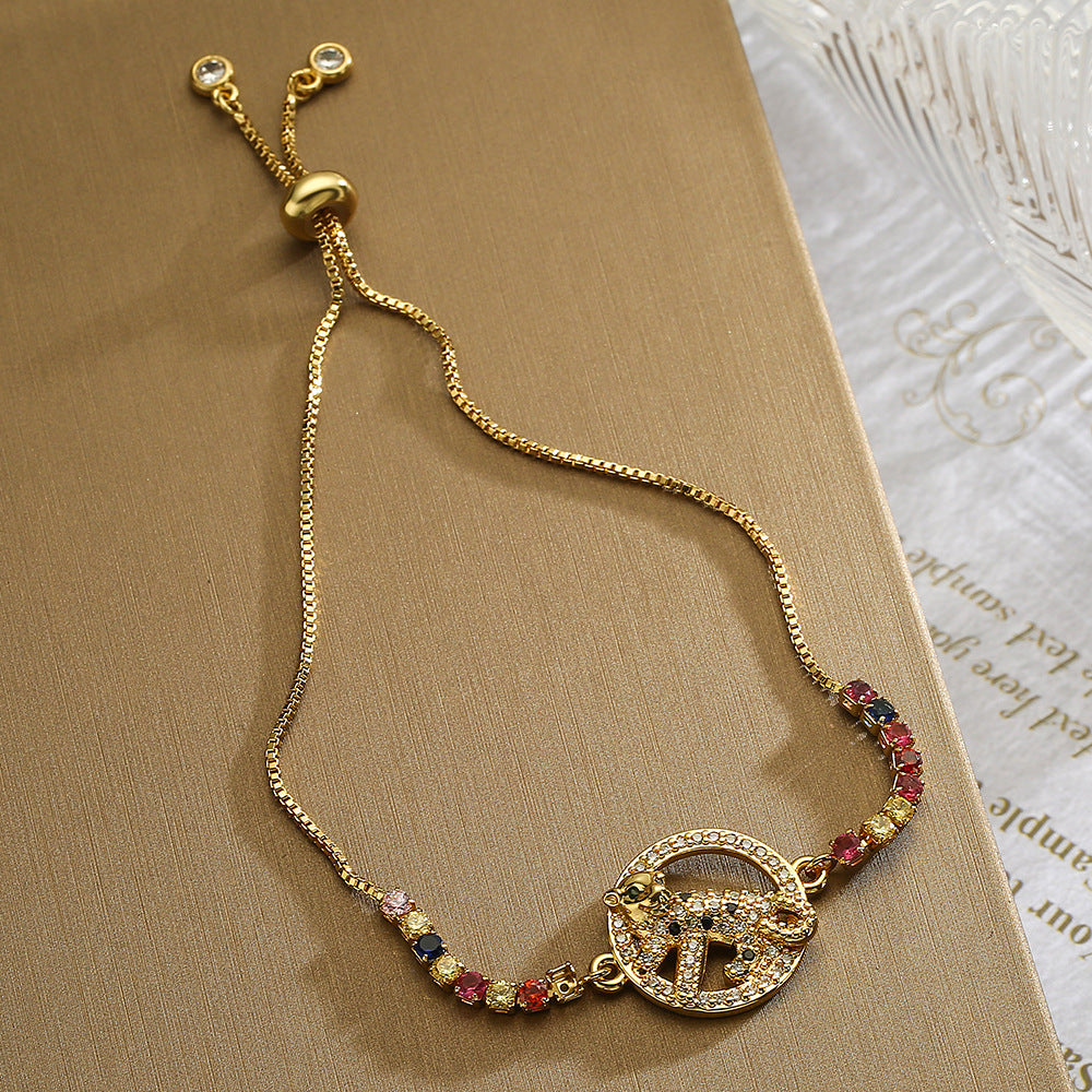 Minimalist Geometric Evil Eye Adjustable Bracelet for Women with Brass Base and Gold Plating Featuring Micro-Pave Leopard Charm