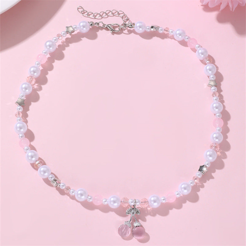 Set di collana per bambine a forma di fiocco minimalista in resina con braccialetto di perline per bambine dai 3 ai 10 anni