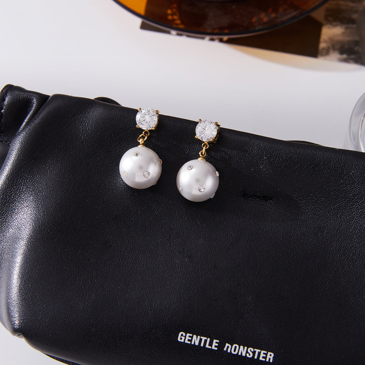 Pendientes de botón geométricos minimalistas de acero inoxidable con incrustaciones de diamantes de imitación para mujer