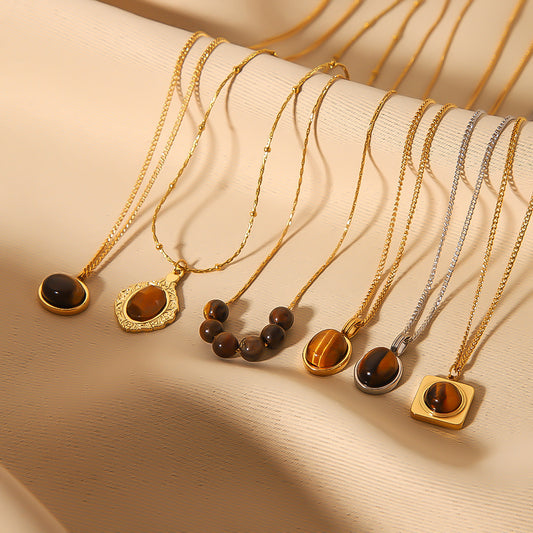 Collana con pendente geometrico vintage stile francese da donna in acciaio inossidabile placcato oro 18 carati con intarsio in occhio di tigre naturale