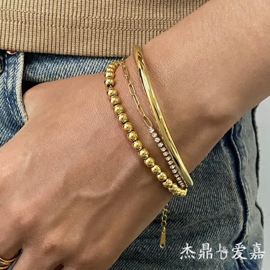 Bracciale da donna placcato in acciaio al titanio con forme geometriche