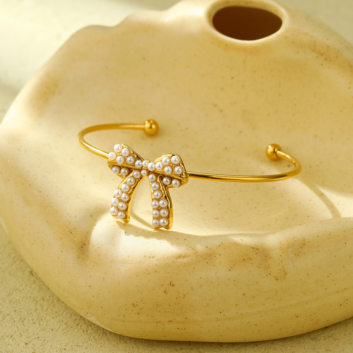 Pendientes de perlas de acero de titanio con forma de lazo y collar de acero inoxidable chapado para mujer