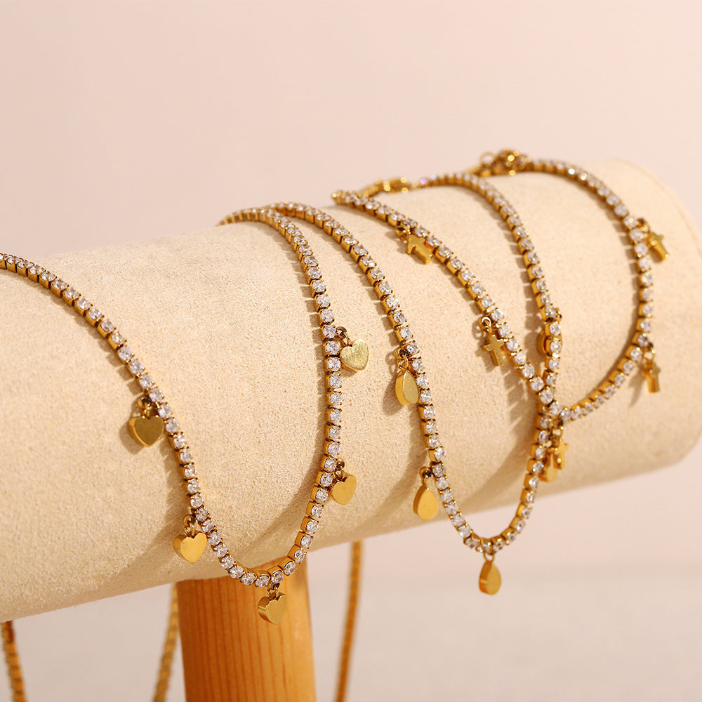 Set collana e bracciale pendente a croce a goccia minimalista in acciaio inossidabile con placcatura in oro 18 carati e accenti di zircone da donna