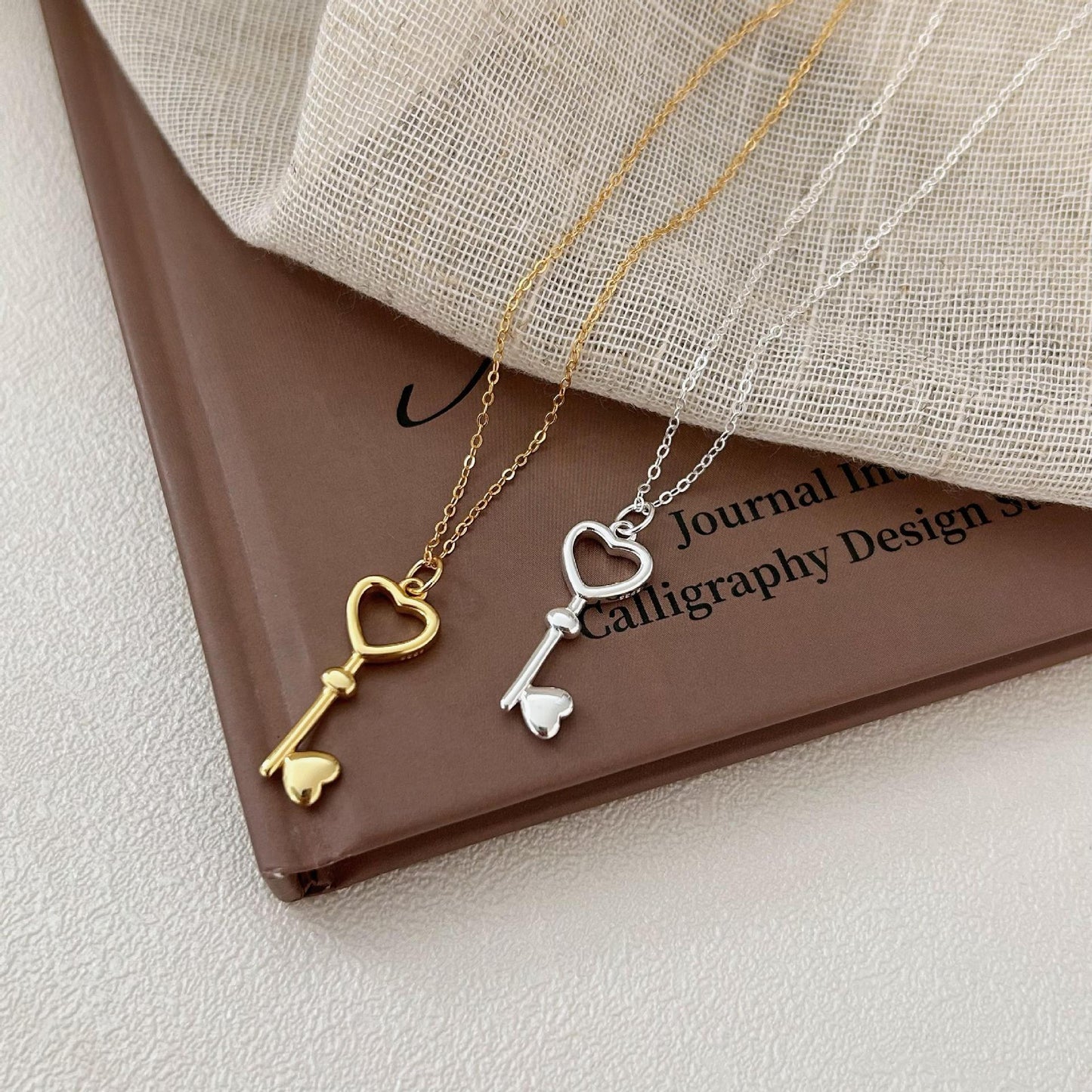 Minimalist Heart-Shaped 925 Sterling Silver Key Pendant Necklace with Plated Finish on Cross Chain