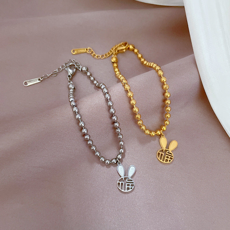 Vintage Korean-Inspired Titanium Steel Rabbit and Chinese Character Fu Pendant Bracelet for Women with Gold Plating and Wavy Texture