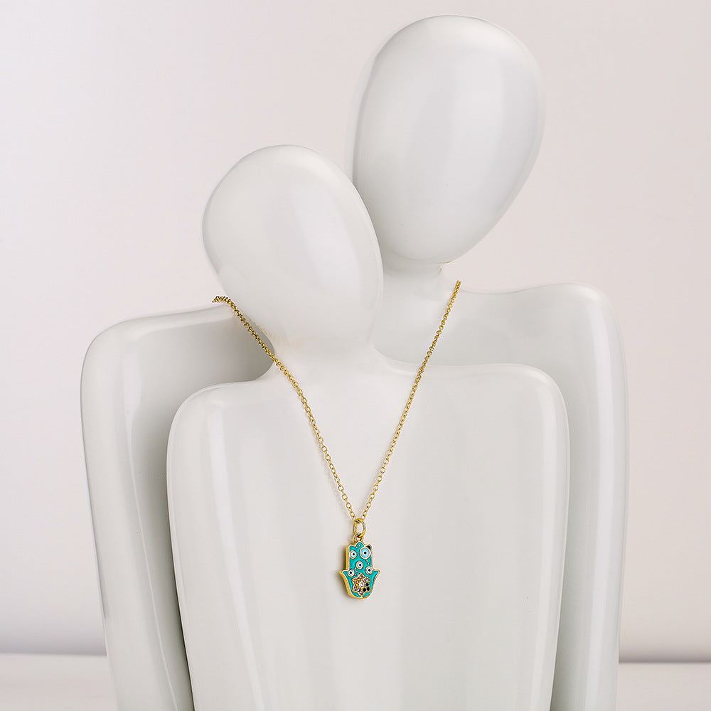 Minimalist Geometric Fatima Hand Pendant Necklace for Women in Copper with 18K Gold Plating and Enamel Finish Featuring Cubic Zirconia Accents