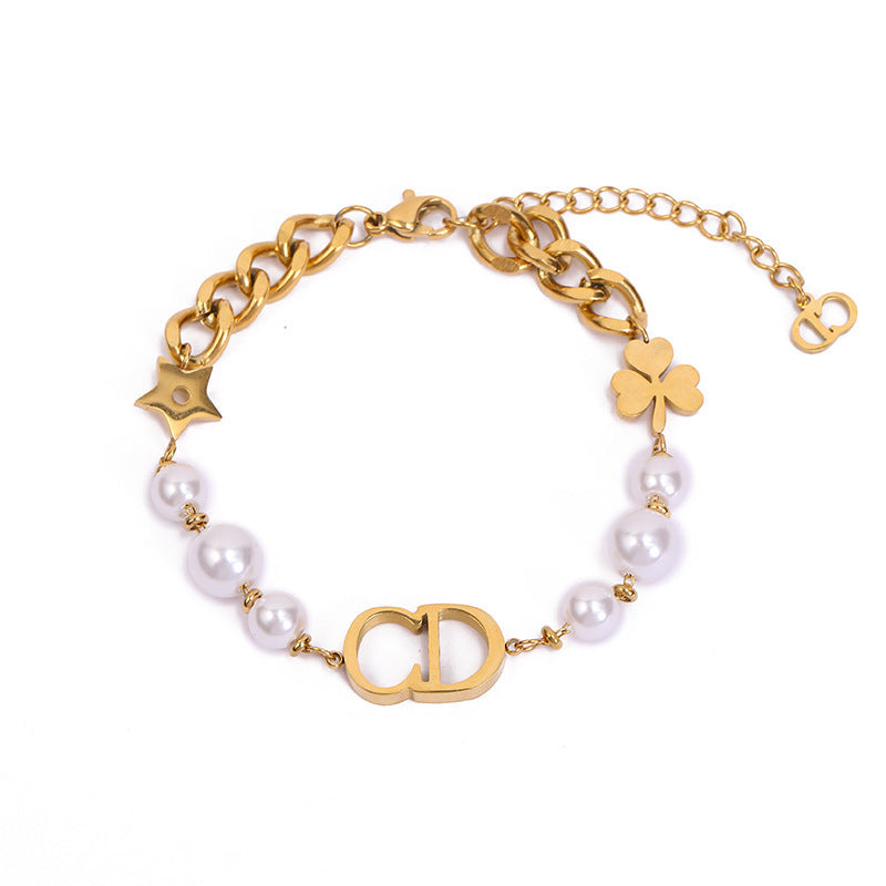 Sweet Minimalist Titanium Steel Bracelet with Gold Plated CD Star and Leaf Charms for Women