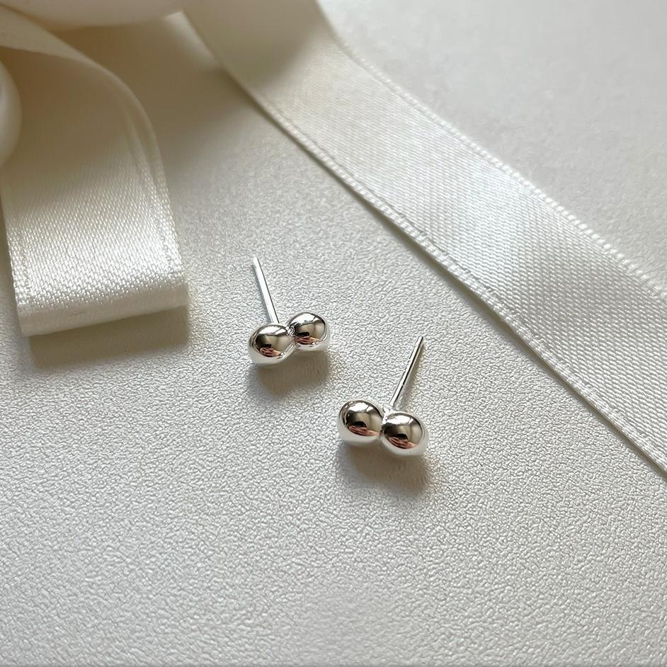 Orecchini a perno tondi a pois in argento Sterling 925 da donna