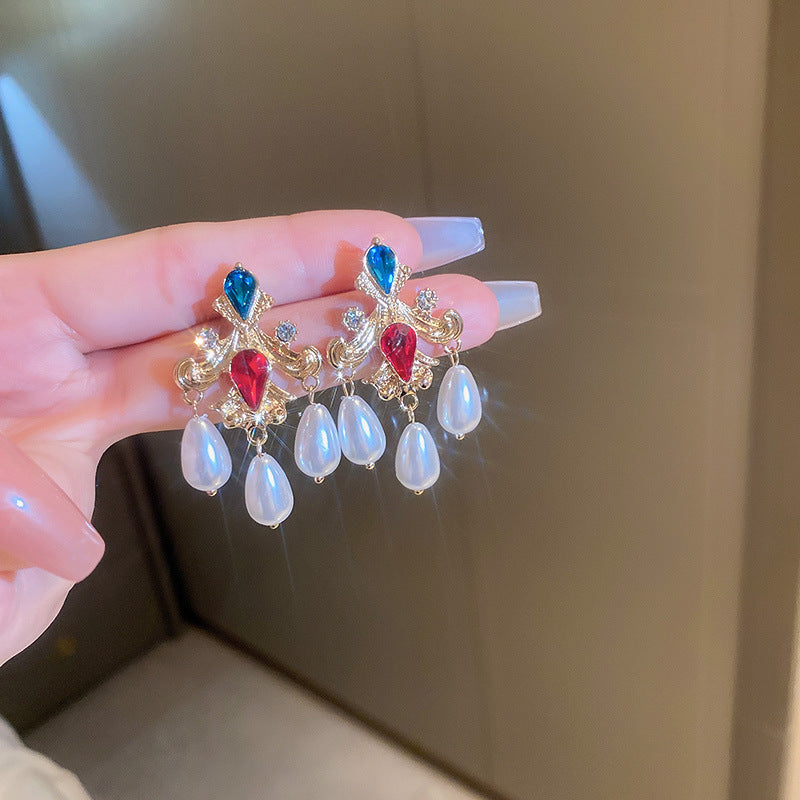 Orecchini a perno geometrici vintage in lega con intarsio di strass per donna