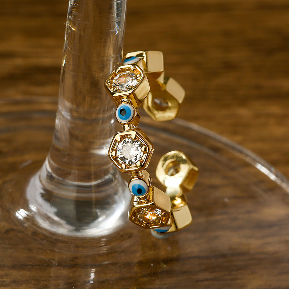 Anello da donna geometrico a forma di occhio, aperto, in rame placcato oro vero con intarsio in zirconi