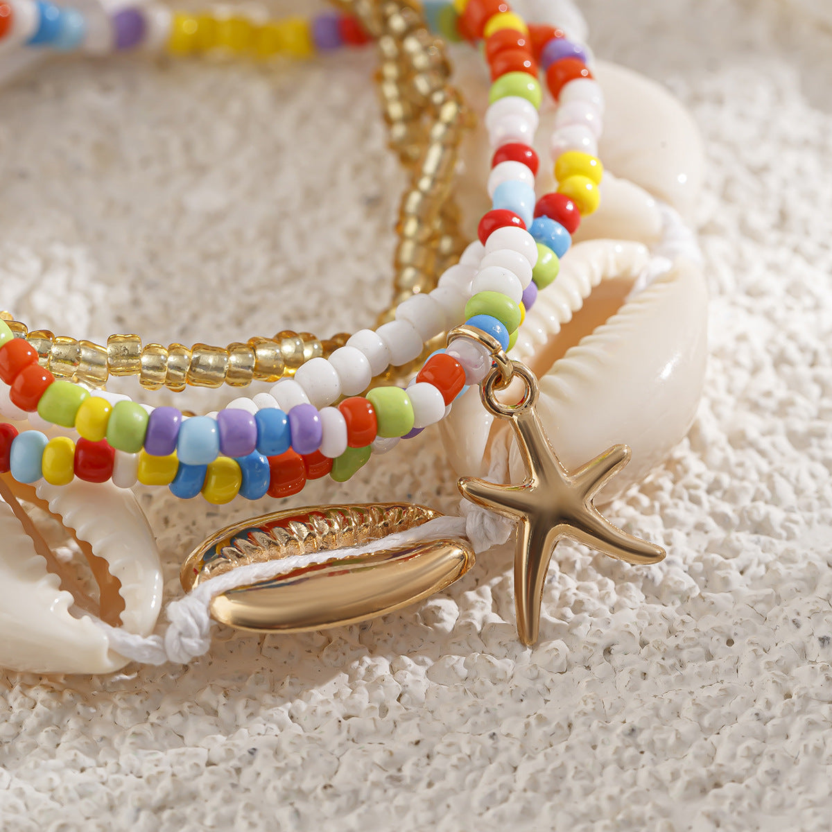 Pulsera de mujer con cuentas de estrella geométrica y conchas de estilo natural con metal chapado