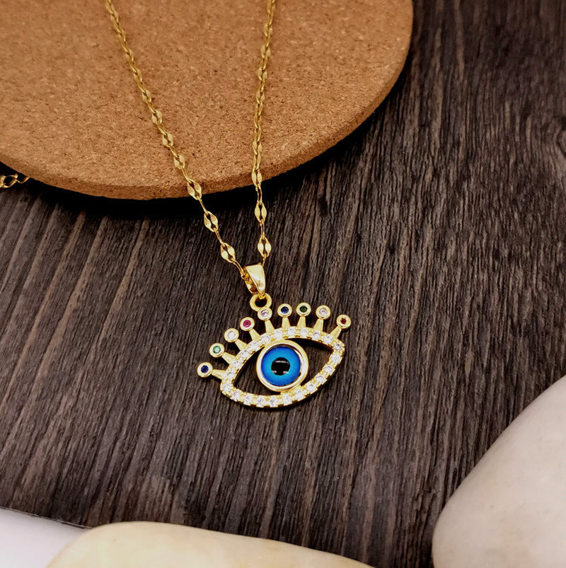 Collana con ciondolo floreale irregolare dal design originale per donna in acciaio al titanio con placcatura in oro, stile catena serpente