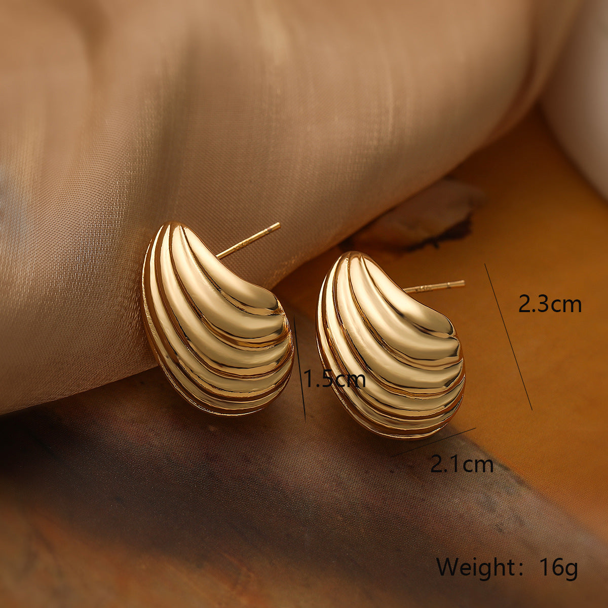 Minimalist Spiral Teardrop Earrings for Women in Copper with Gold Plating and Micro-Pave Setting