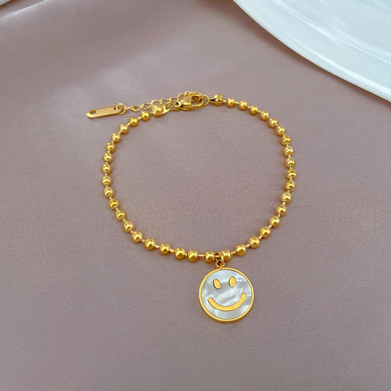 Retro Minimalist Round Disc Smile Shell Bead Bracelet for Women in Titanium Steel with Gold Plating and Wavy Texture