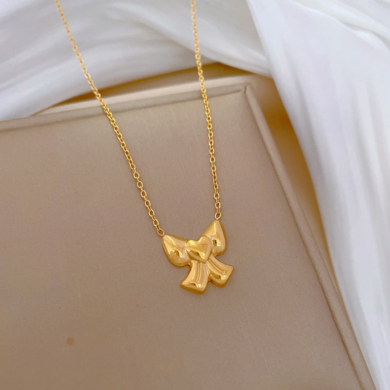 Minimalist Bowknot Heart Pendant Necklace for Women in Titanium Steel with Gold Plating, Clavicle Chain