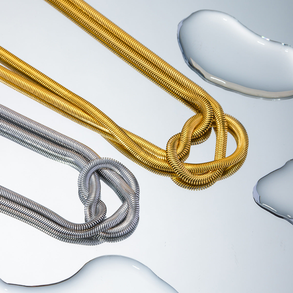 Minimalist Geometric Knot Pendant Necklace in Titanium Steel with Gold Plating on Stainless Steel Snake Chain for Women